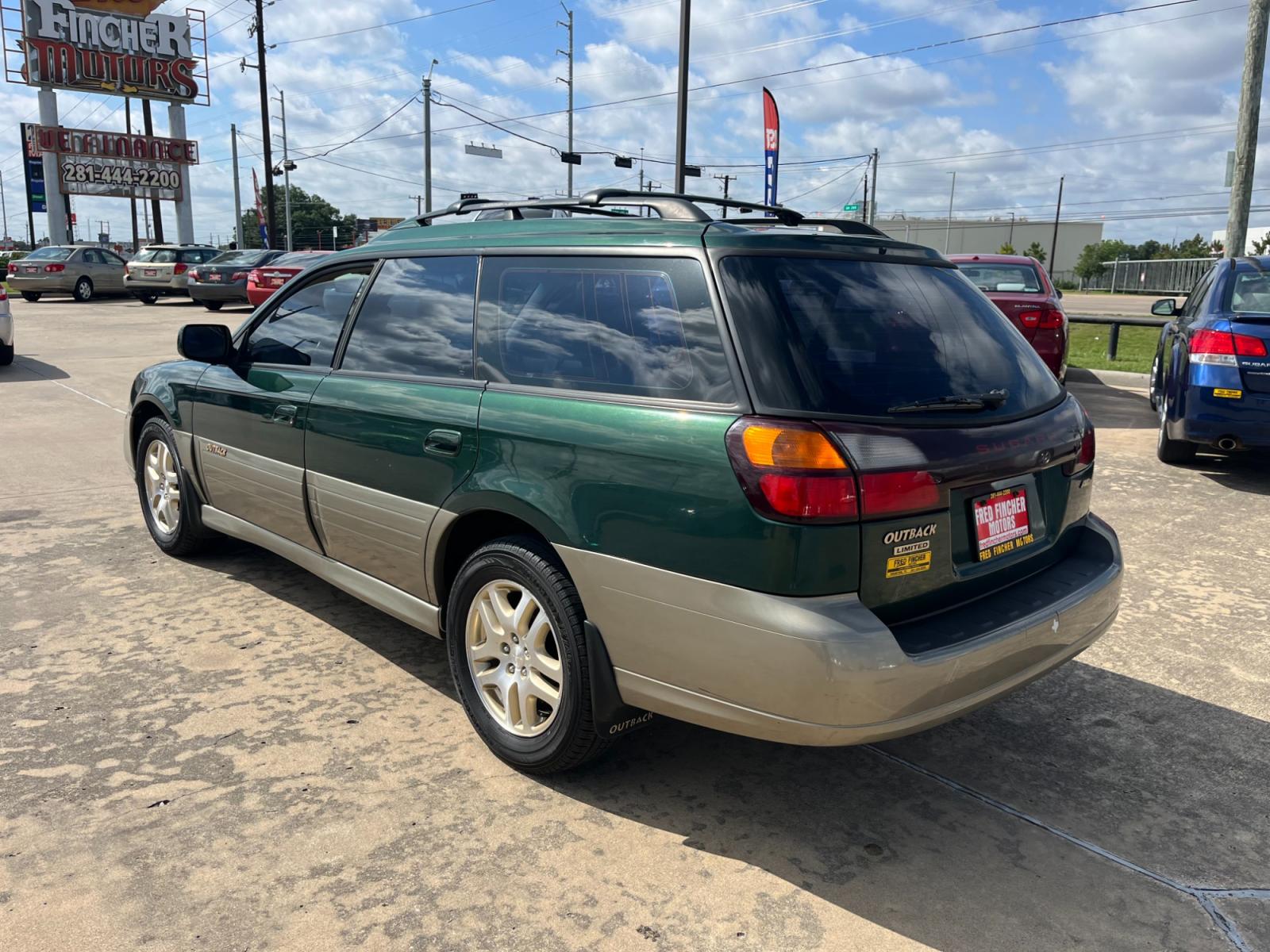 2003 green /TAN Subaru Outback Limited Wagon (4S3BH686737) with an 2.5L H4 SOHC 16V engine, 5-Speed Manual Overdrive transmission, located at 14700 Tomball Parkway 249, Houston, TX, 77086, (281) 444-2200, 29.928619, -95.504074 - Photo #4